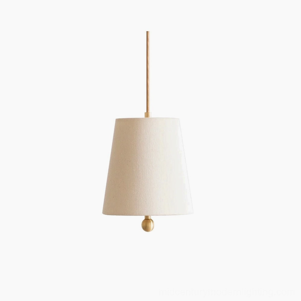 Bonny mid-century modern pendant lamp with tapered linen fabric shade and brass finial detail, studio front view