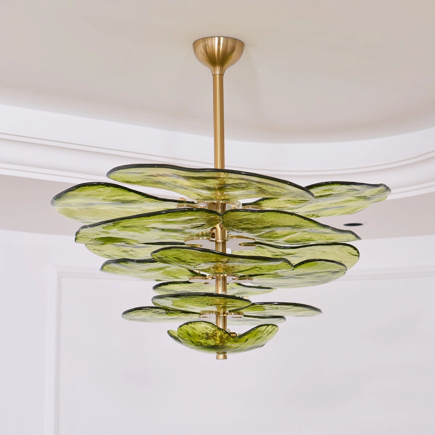 Botanical glass lotus leaf chandelier with tiered petal arrangement and warm brass finish