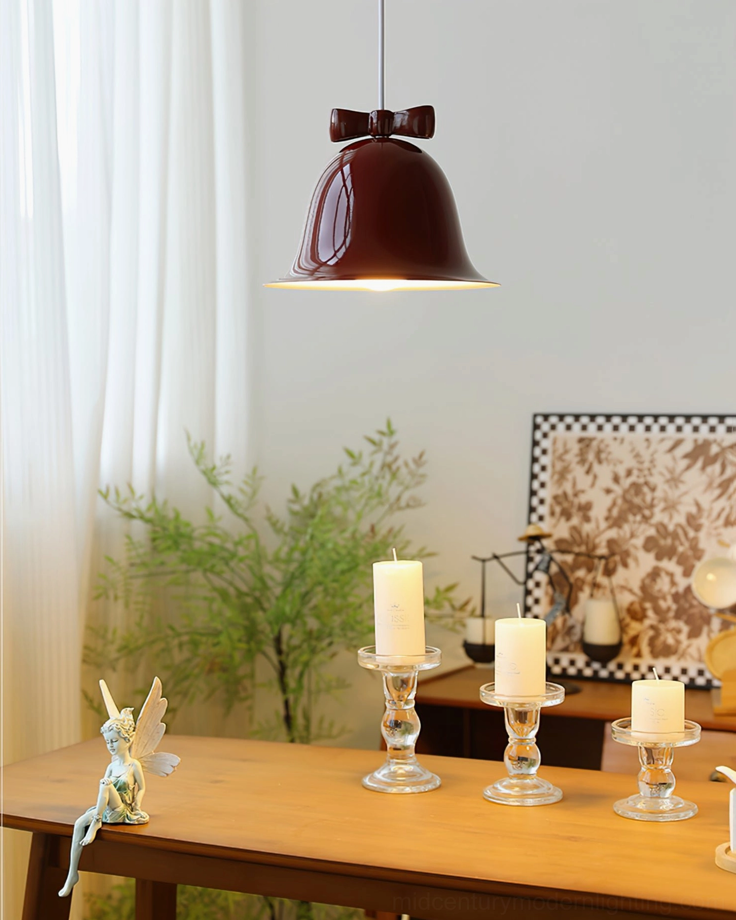 Wine-red bell pendant with dark brown bow in minimalist dining area display