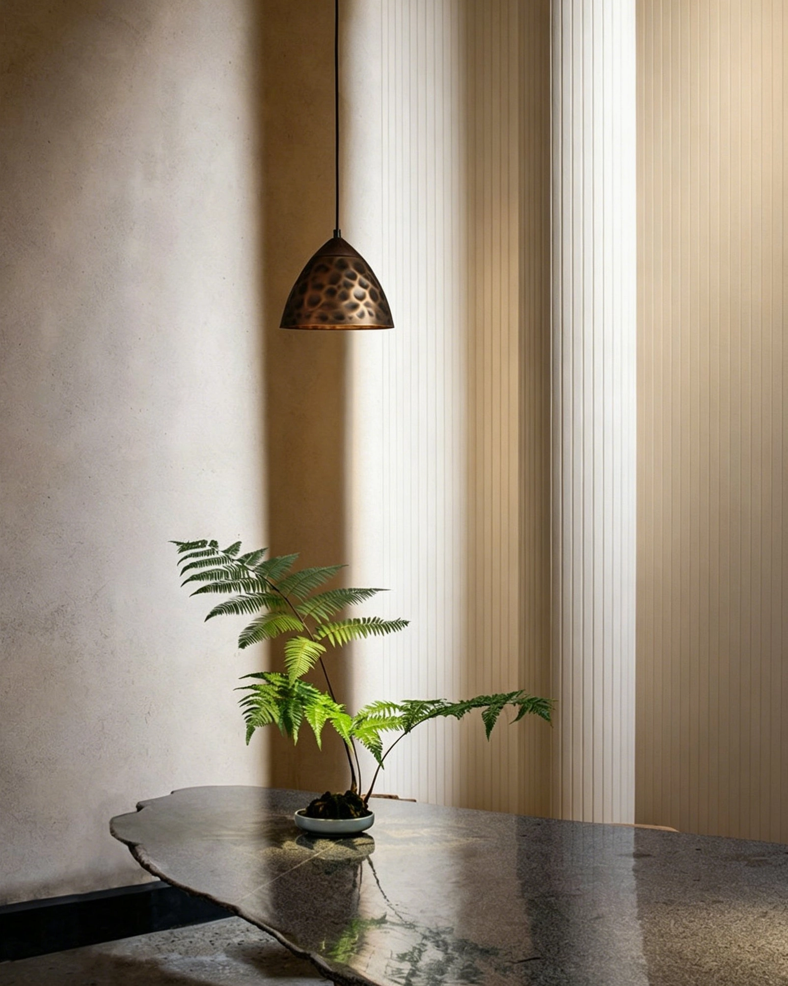 Mini Boyd brass pendant lamp minimalist interior dark marble table contemporary warm neutral lighting