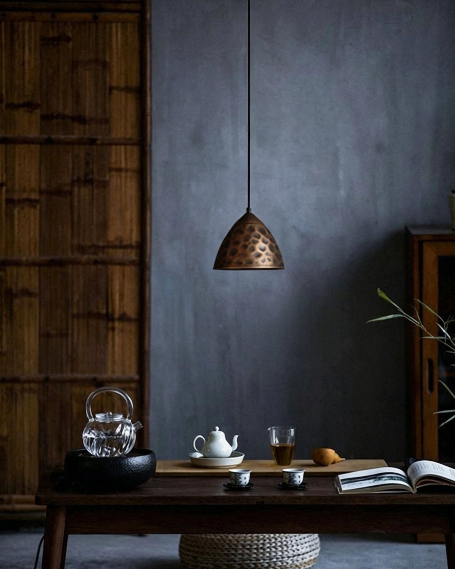 Boyd brass pendant lamp close-up detail organic modernist conical form antique bronze patina texture