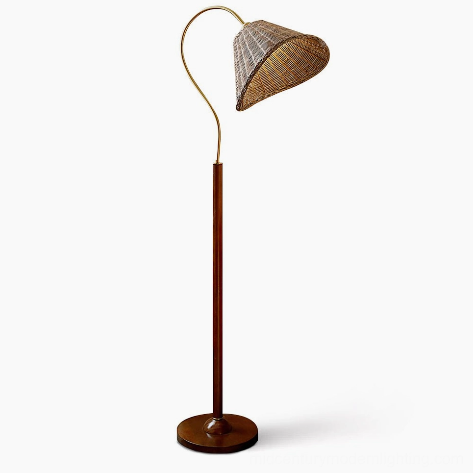Brady mid-century modern rattan floor lamp with hand-woven shade, walnut wood accents, and brass frame on white studio background