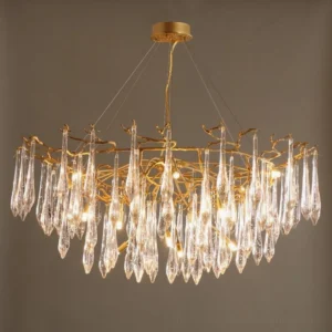 Luxury branch brass chandelier 12 heads with warm glowing illumination mounted on dark gray wall