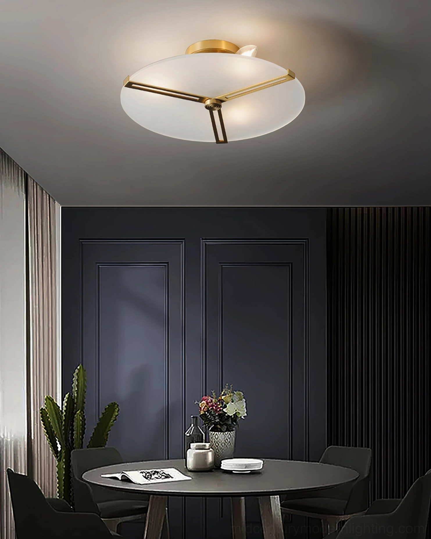 Geometric brass flush mount lamp creating soft diffused light in contemporary bedroom