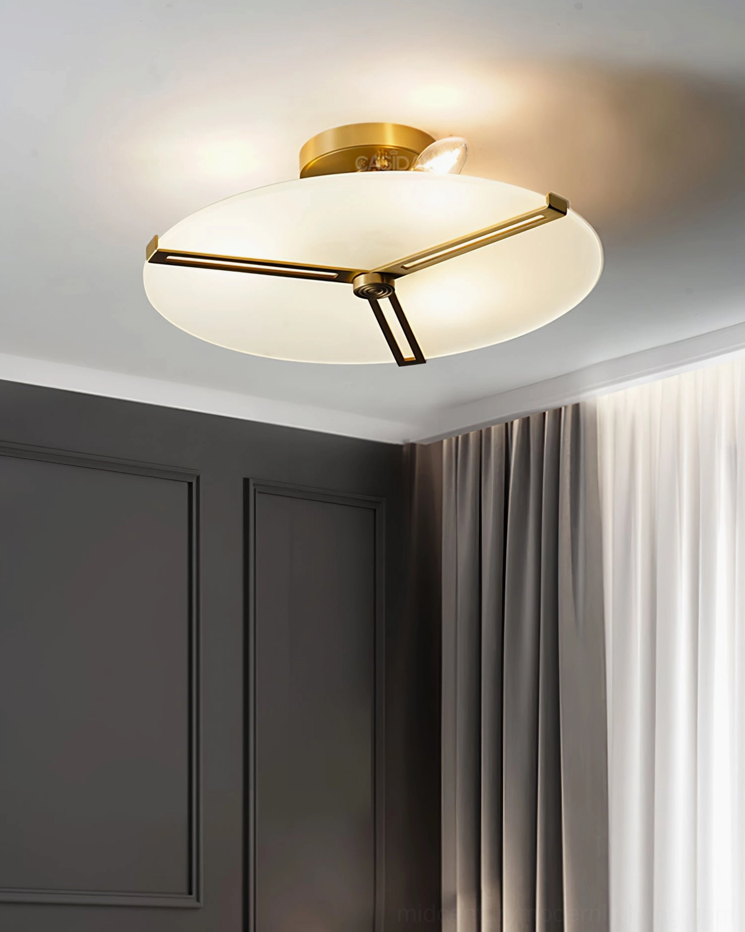 Side view of brass ceiling lamp mounted on residential ceiling with natural lighting