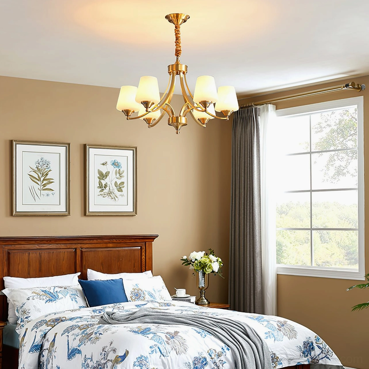 8-light brass chandelier illuminating master bedroom with wooden bed frame and botanical wall art
