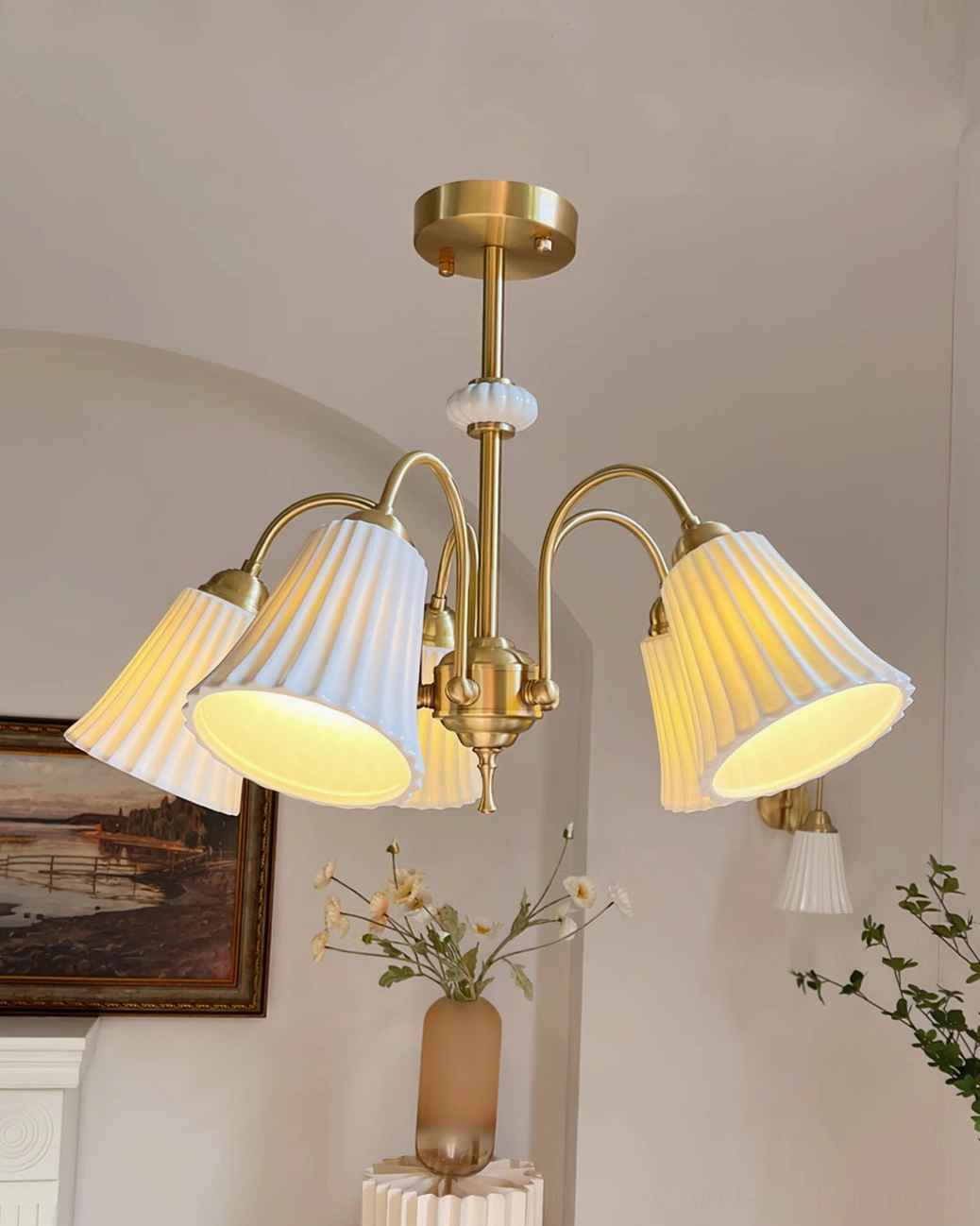 Brass pendant chandelier with pleated white glass shades, detailed view highlighting premium craftsmanship and mid-century modern construction
