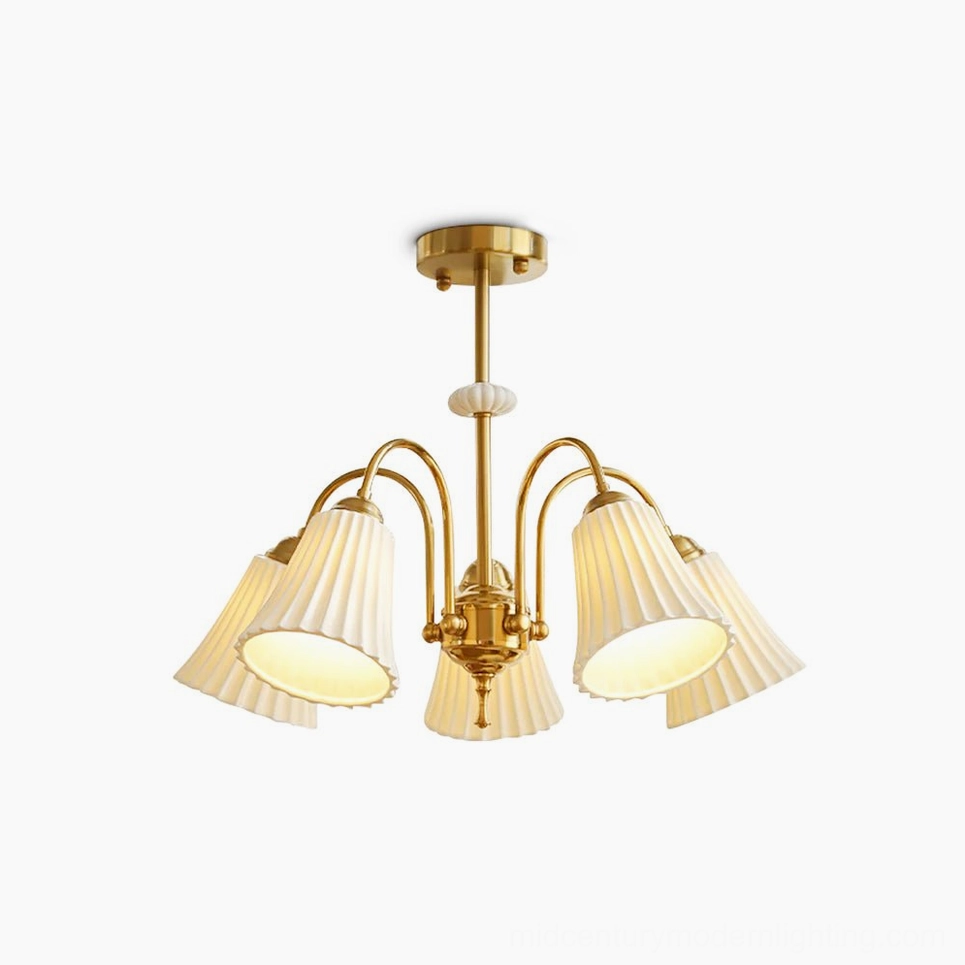 Overhead view of 5-head brass pendant chandelier with white pleated glass shades in studio setting, showcasing classic mid-century modern design