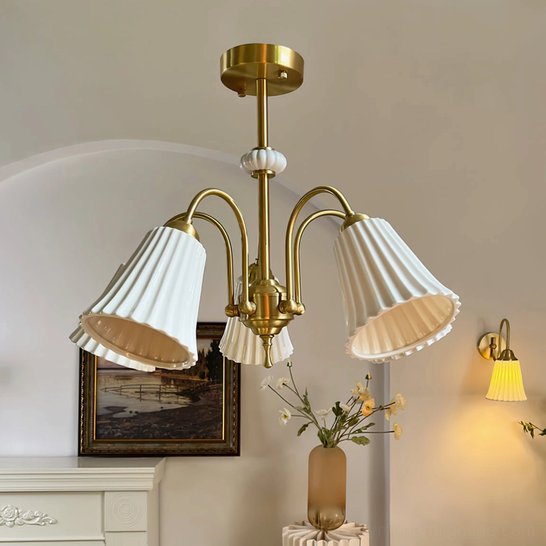 Installed brass pendant chandelier in residential interior showcasing how mid-century modern lighting complements contemporary home décor and architecture