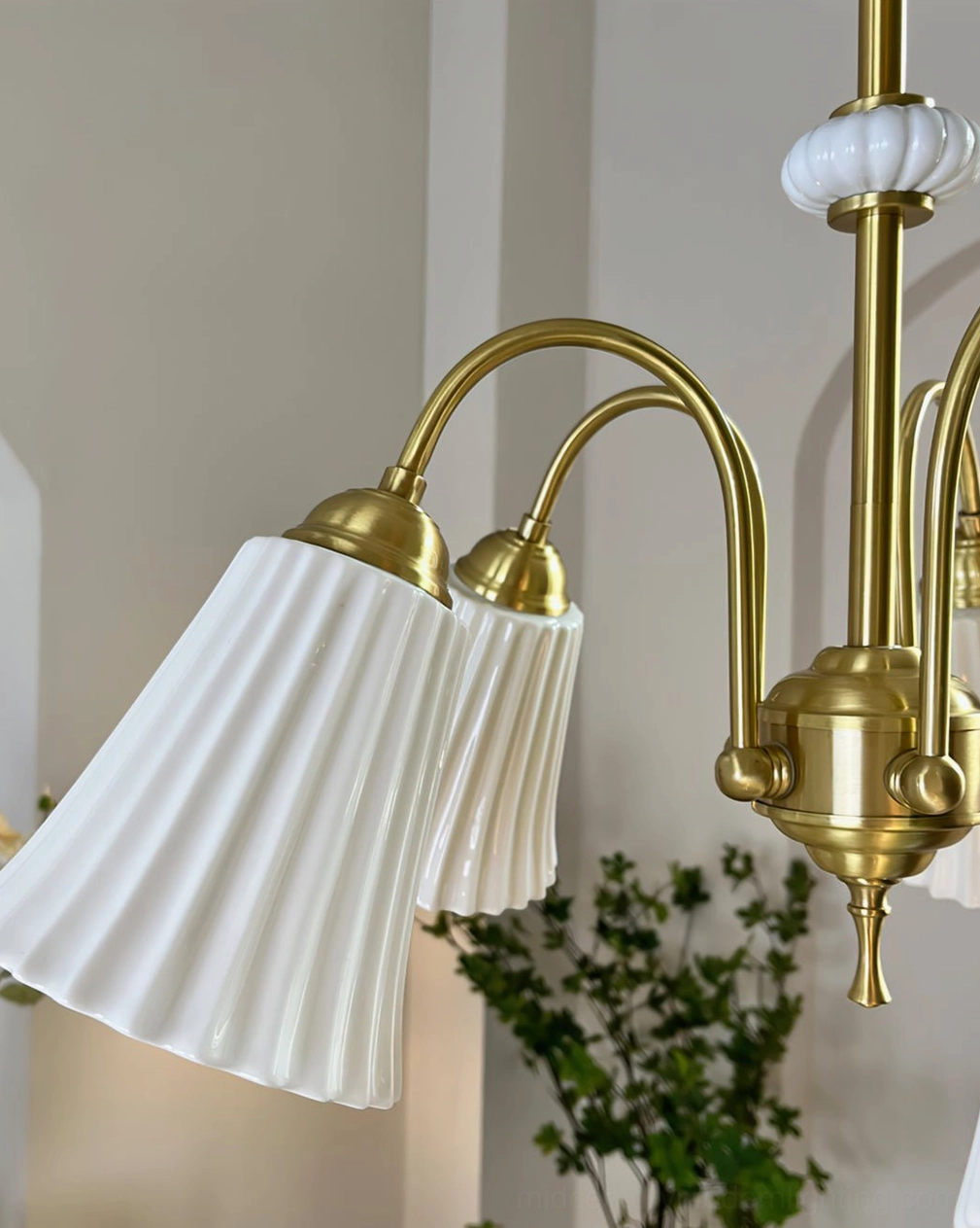 Brass pendant chandelier with white ribbed glass shades in decorative interior setting, French vintage and mid-century modern design inspiration