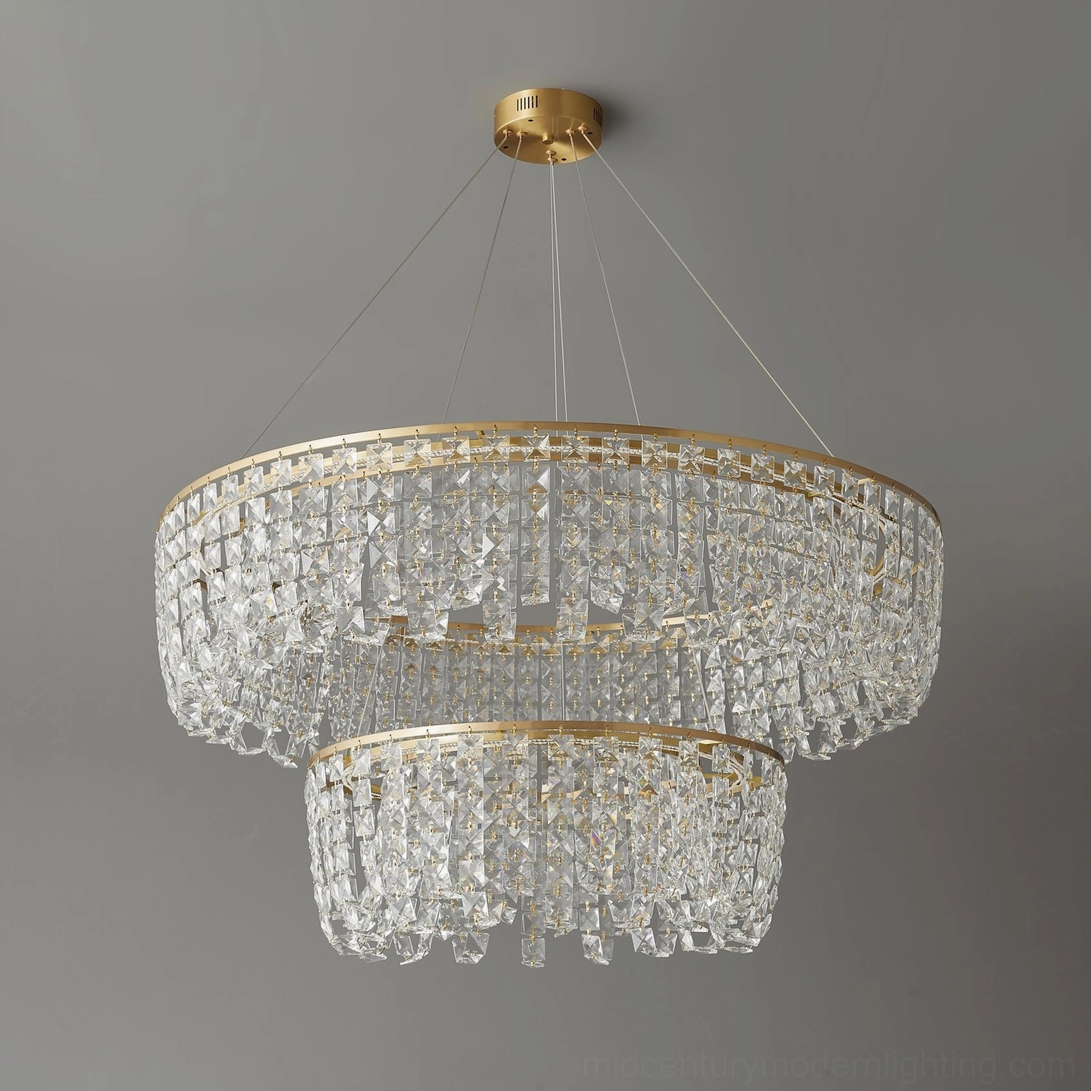 Brass chandelier suspended wire and canopy assembly showing professional installation