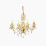 Brass crystal chandelier with 8 candle-style lights and cascading clear crystal pendants, top-down studio view