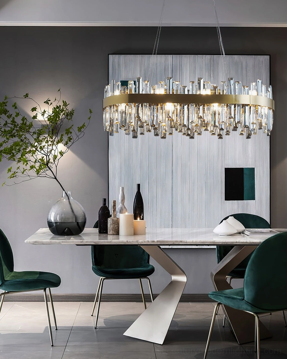 Elegant brass crystal chandelier in minimalist white dining room with green chairs and ambient warm glow