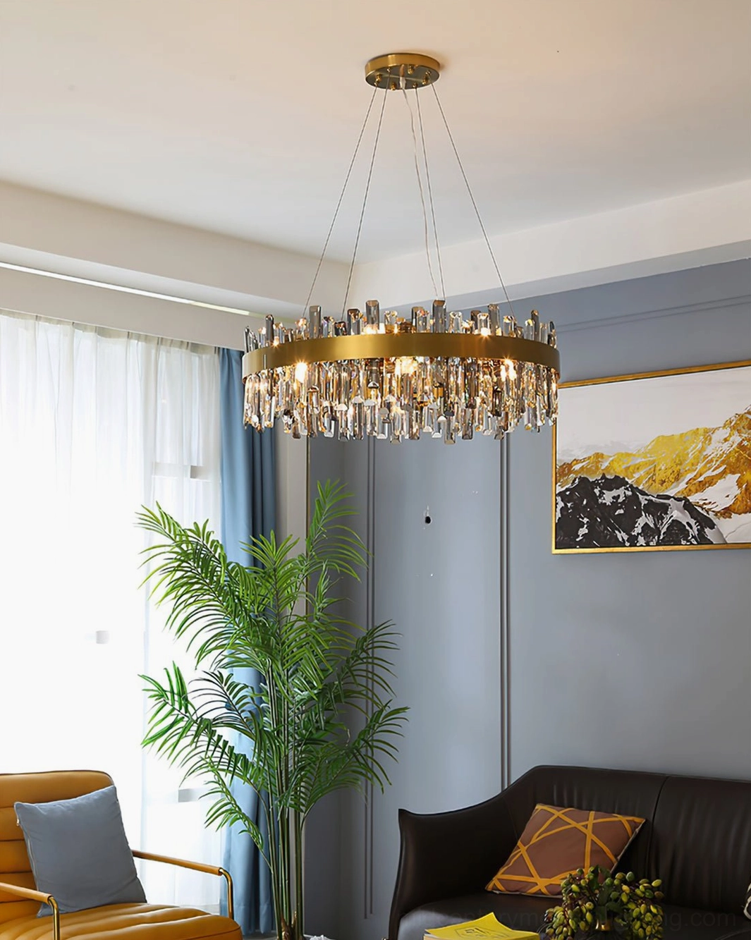 Round brass crystal chandelier side profile showing geometric design and crystal pendant spacing