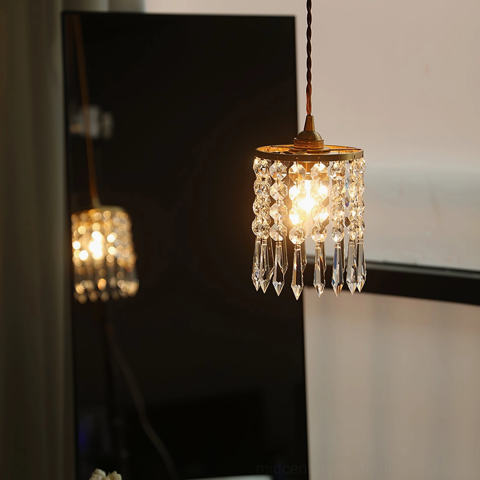 Clear crystal pendant fixture with brass top, bedroom wall-mounted installation