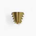 Brass gold geometric wall sconce front view with conical tapered shade and spherical stud details on white background