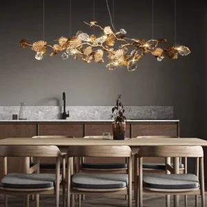 Brass leaf chandelier installed above dining table - warm gold finish mid-century modern interior lighting