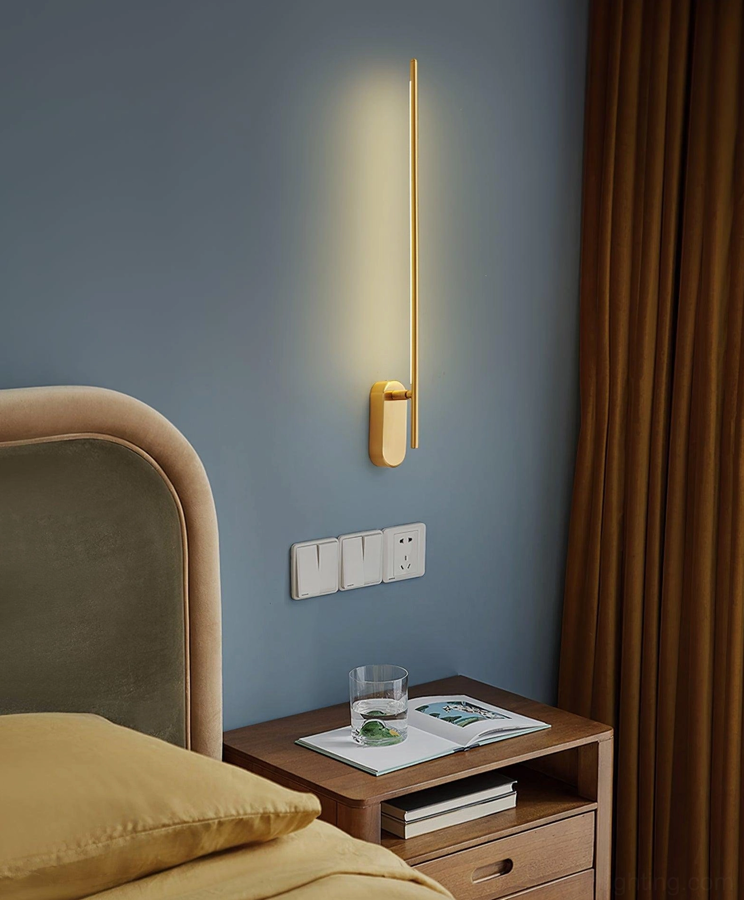 Brass gold linear sconce master bedroom warm ambient glow