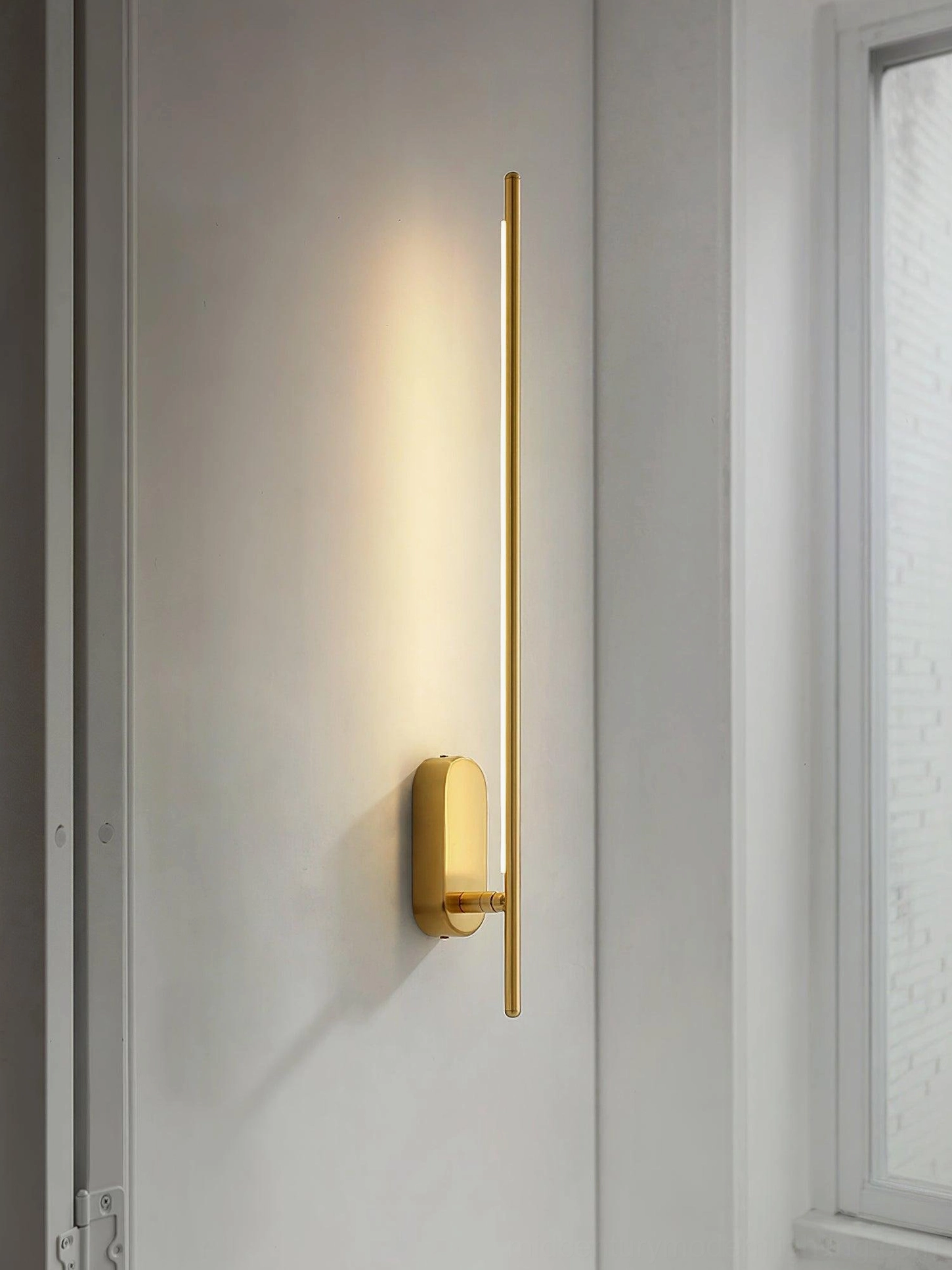 Brass linear sconce residential hallway minimalist modern lighting
