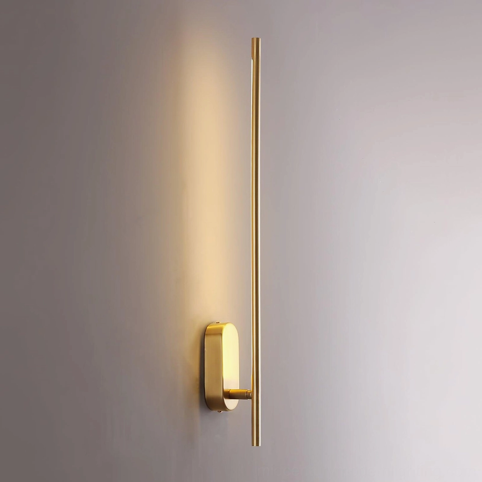 Brass linear sconce warm light ambient bedroom modern style