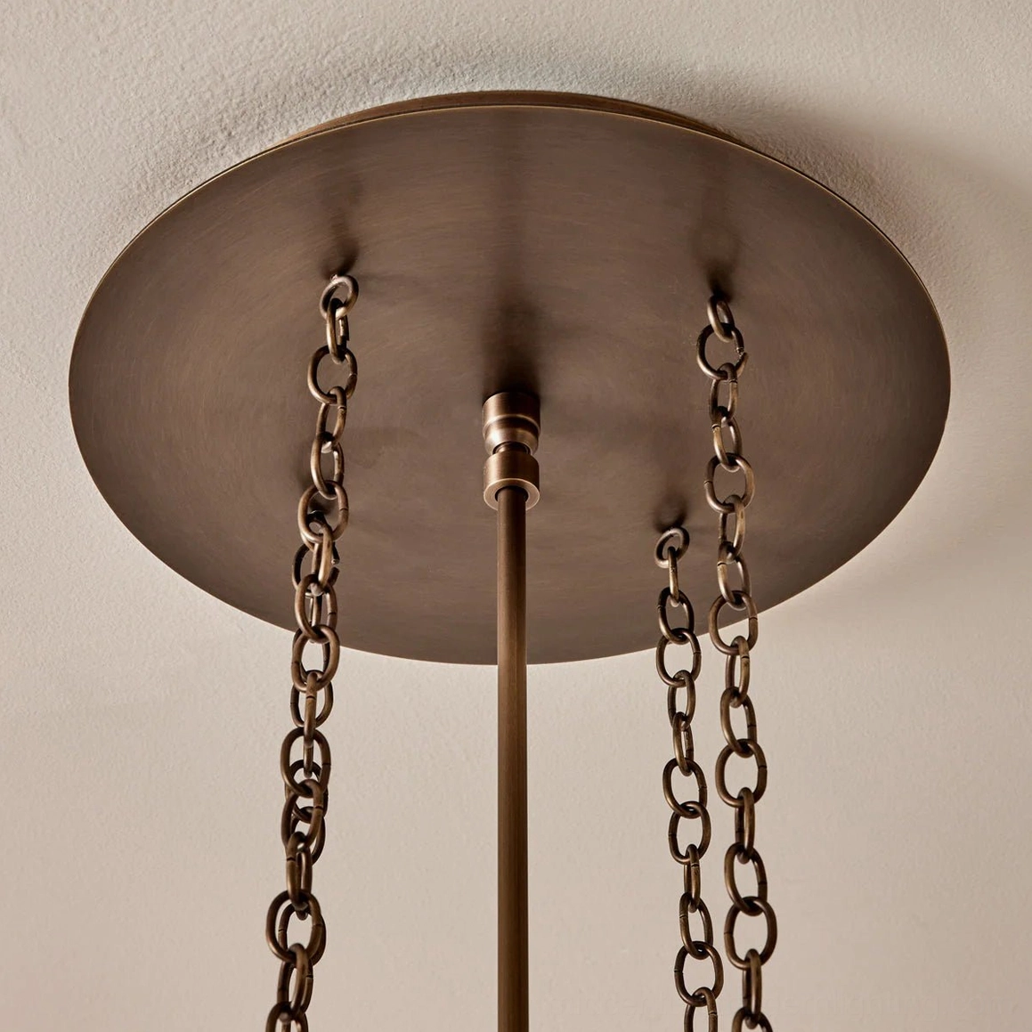 Brass pleated pendant chandelier ambient room lighting demonstration