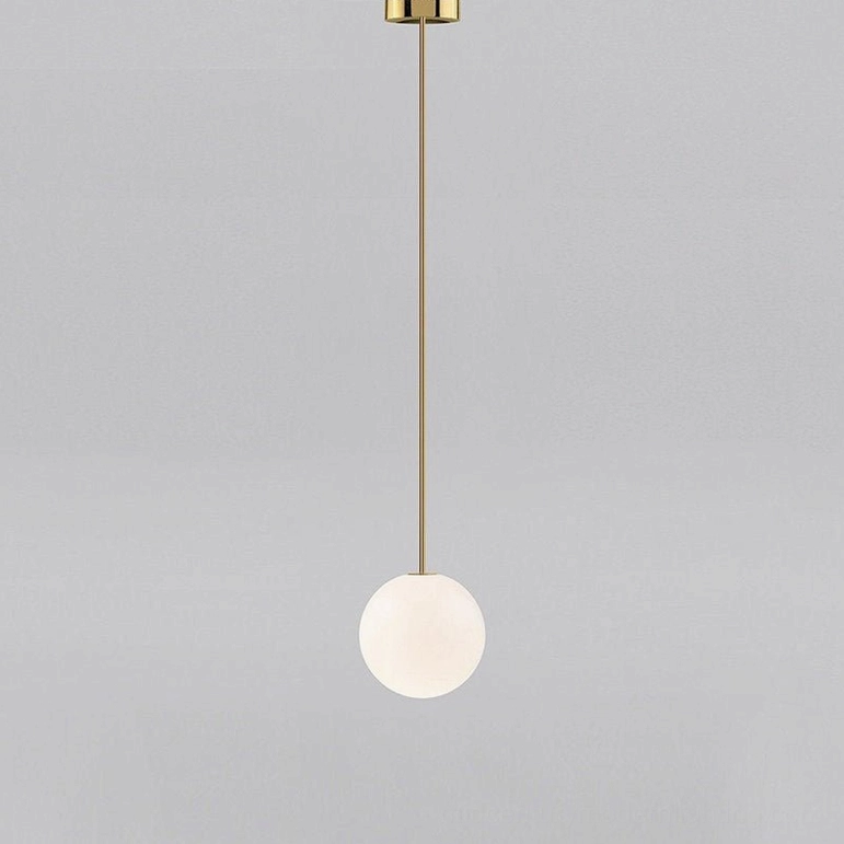 Brass suspension rod and globe pendant light showing architectural structural elegance