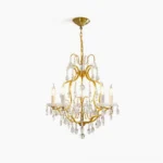 Brass scrolls crystal chandelier front view with five light heads and hanging crystal droplets on white background