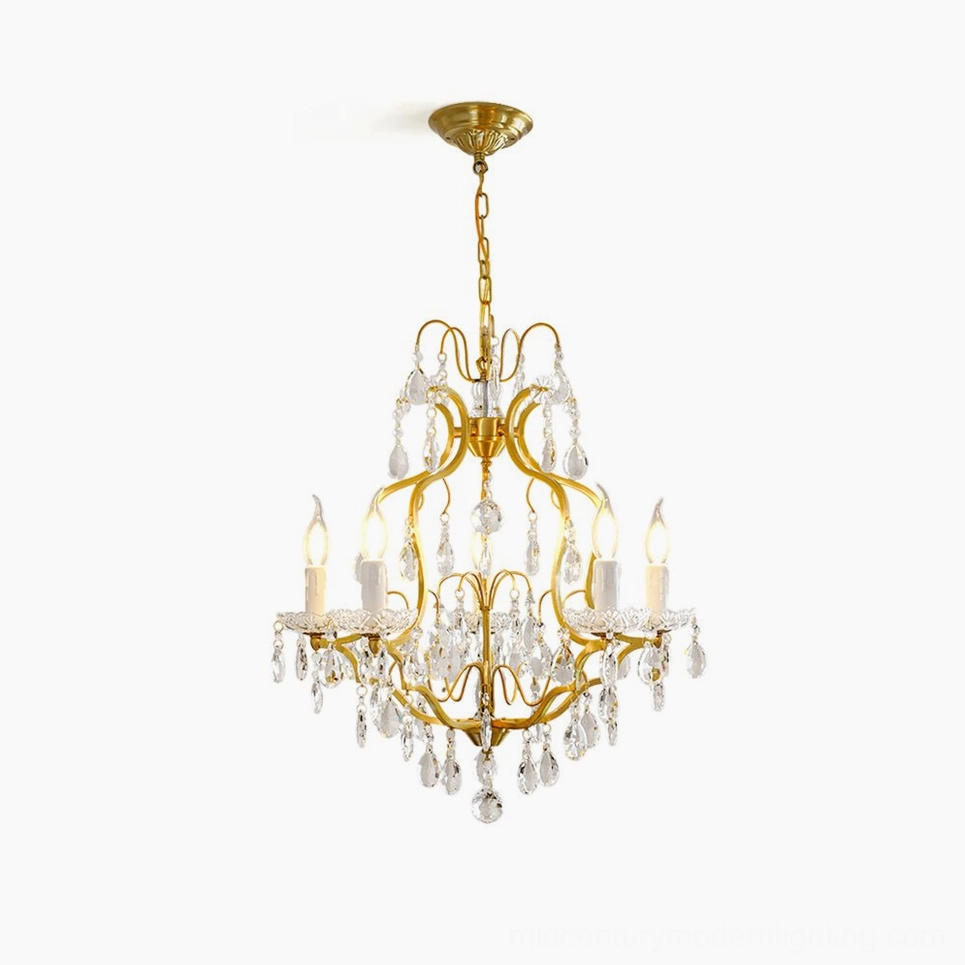 Brass scrolls crystal chandelier front view with five light heads and hanging crystal droplets on white background