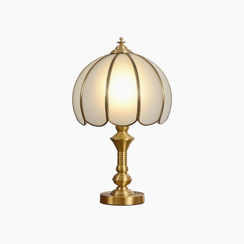 Brass and frosted white glass table lamp variant showing finish options available