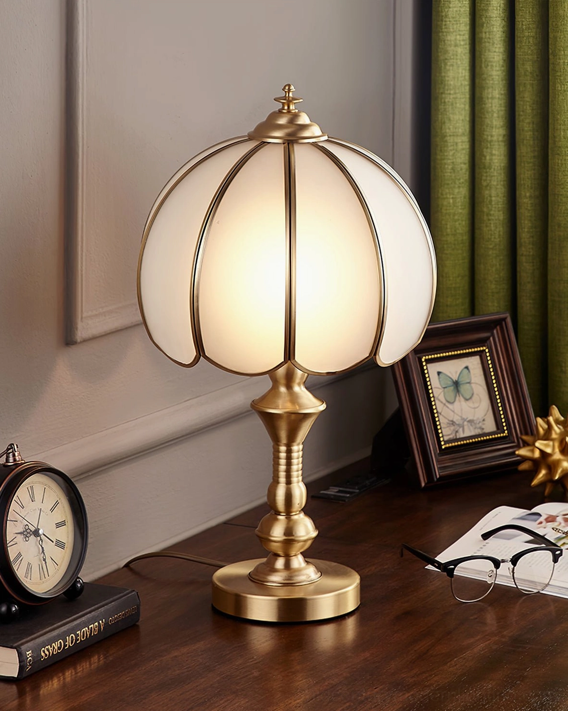 Brass table lamp alongside classic mid-century modern decor and furniture styling