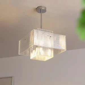Brenna pendant light installed in warm residential ceiling with ambient glow and layered fluted glass