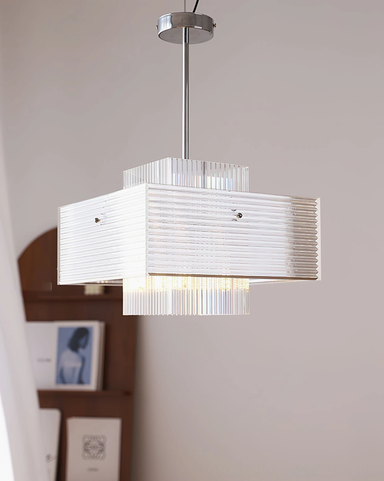 Side profile of Brenna geometric chandelier with chrome ceiling hardware and minimalist aesthetics