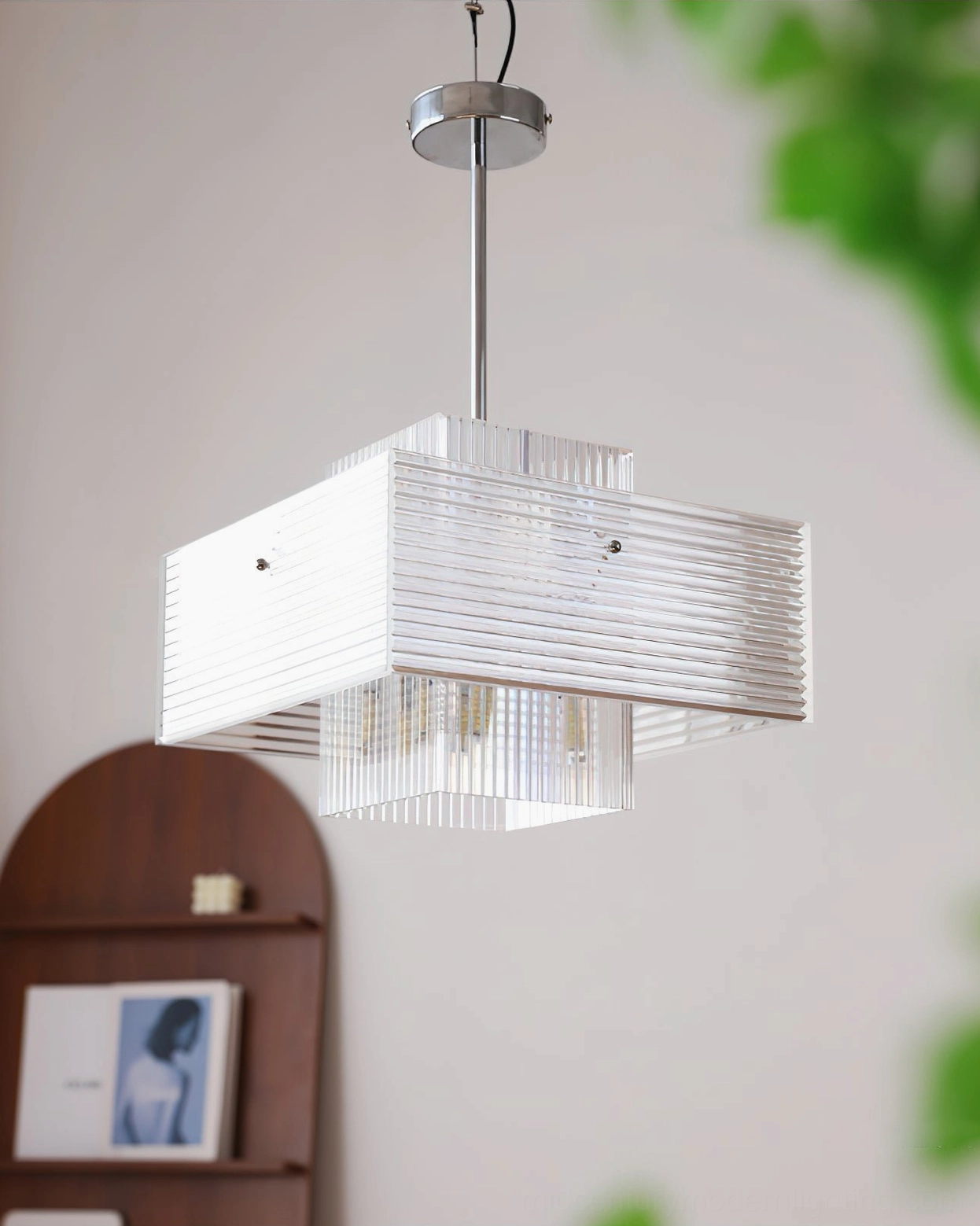 Brenna fluted glass pendant light three-quarter side view with wooden shelf and green plant styling