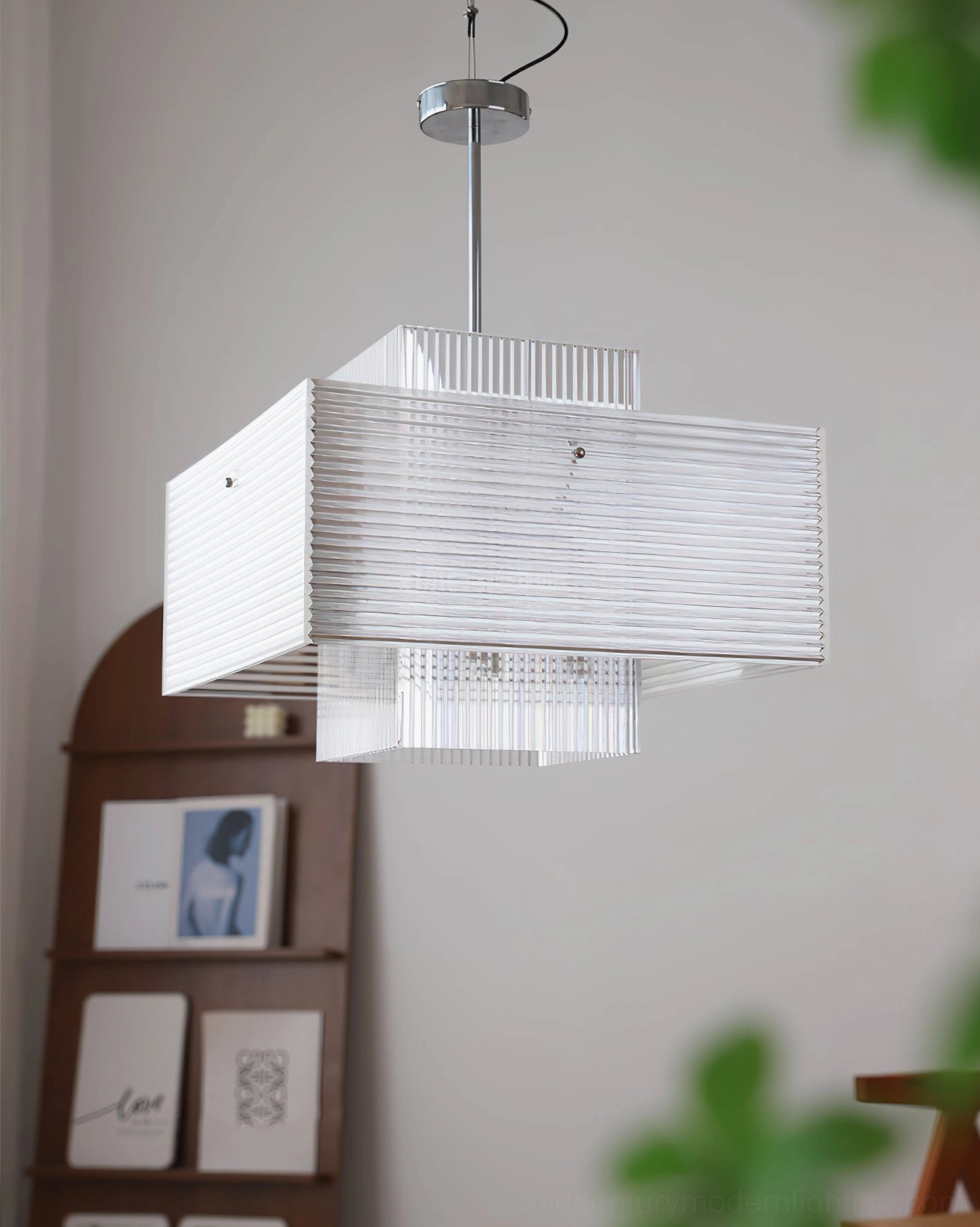 Brenna contemporary glass chandelier suspended with visible layered ribbed glass and chrome hardware