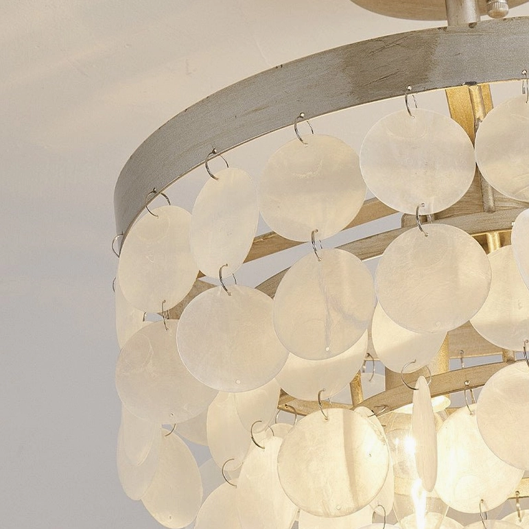 Brielle ceiling lamp gold finish with warm ambient light in contemporary interior space