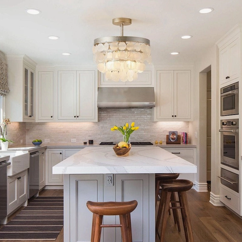 Brielle capiz shell chandelier over modern farmhouse kitchen island with functional overhead lighting
