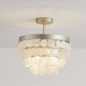 Brielle ceiling lamp glowing upward angle with warm light through layered capiz shell shade