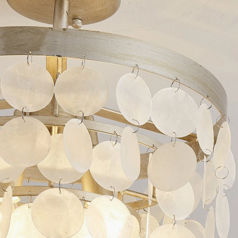 Brielle coastal-inspired ceiling lamp in transitional room with shell shade and metallic accents