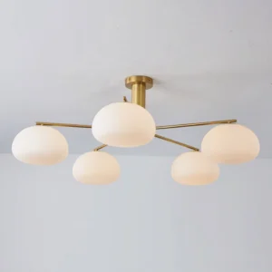 Briette sputnik flush mount ceiling fixture installed in modern residential interior showing warm ambient lighting from opal glass shades