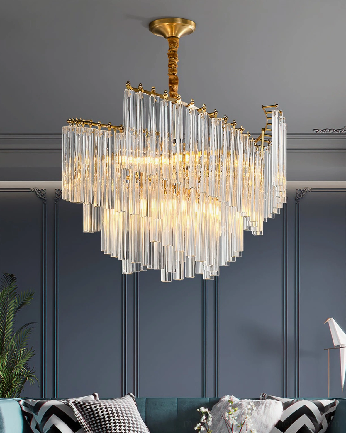Brinicle crystal chandelier bottom view revealing intricate crystal rod layering and brass base