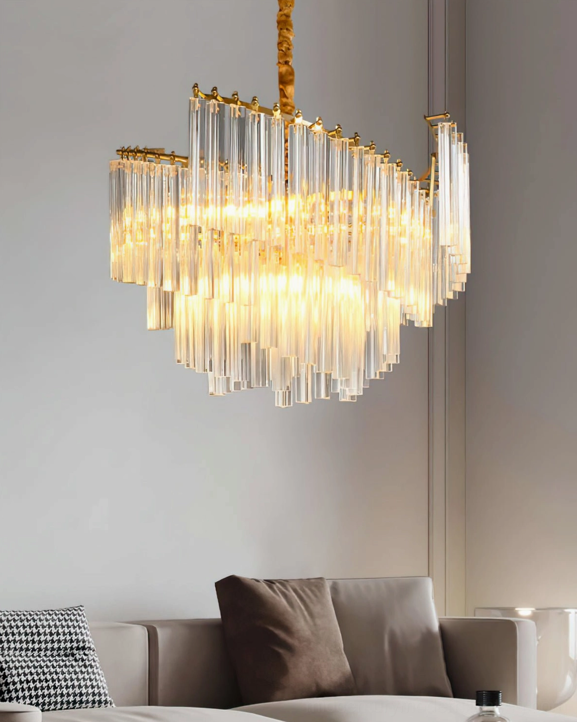 Brinicle tiered crystal chandelier with warm internal lighting and uniform layered crystal rods