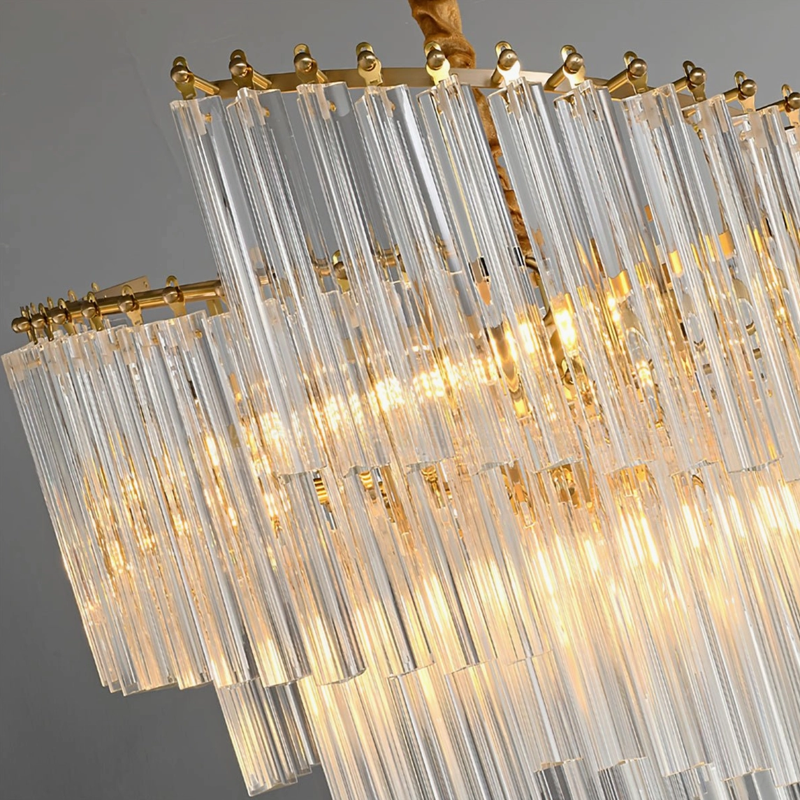 Brinicle crystal tiered chandelier profile view showcasing elegant brass and crystal silhouette