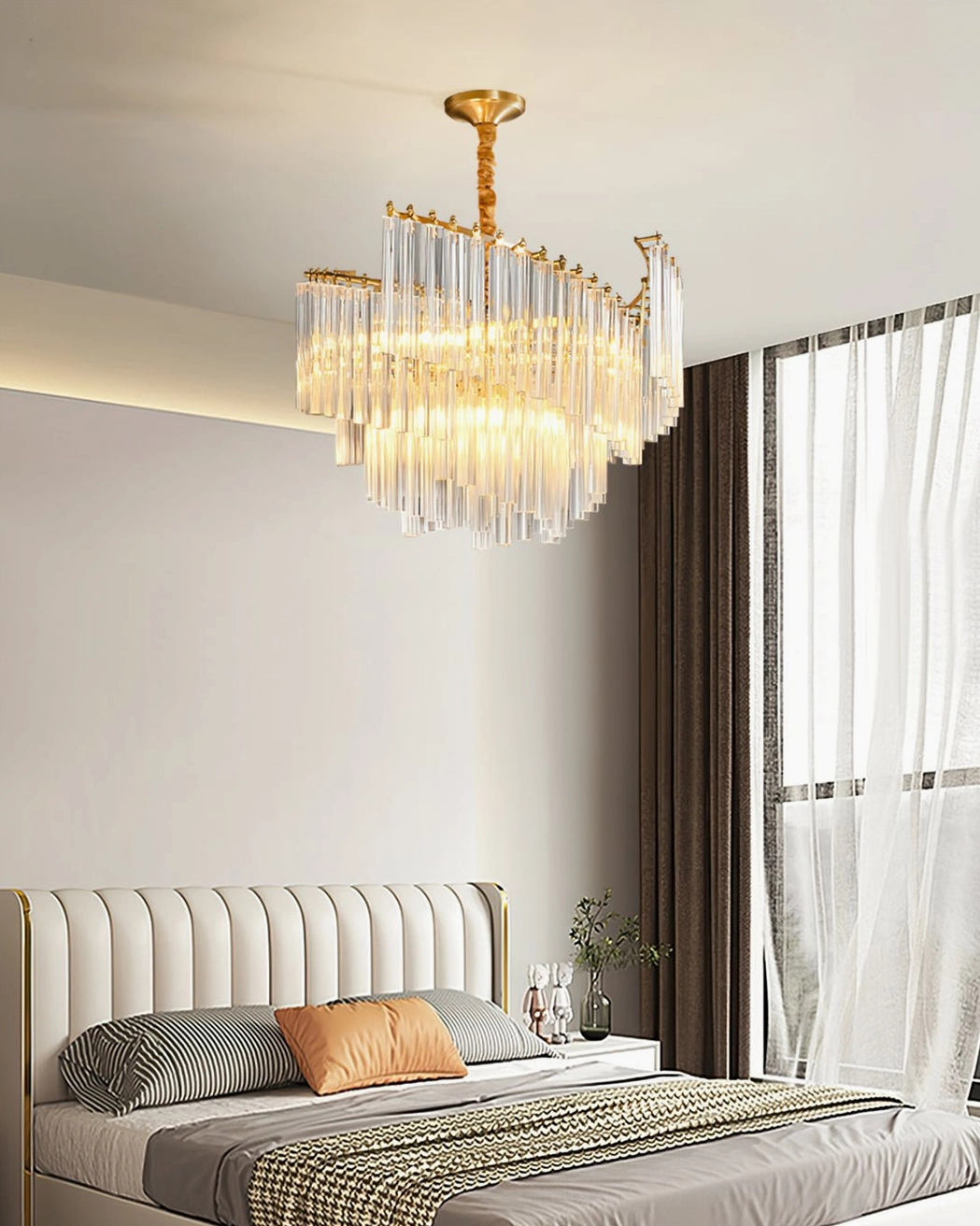Brinicle brass crystal chandelier detail view showing crystal rod construction and brass framework