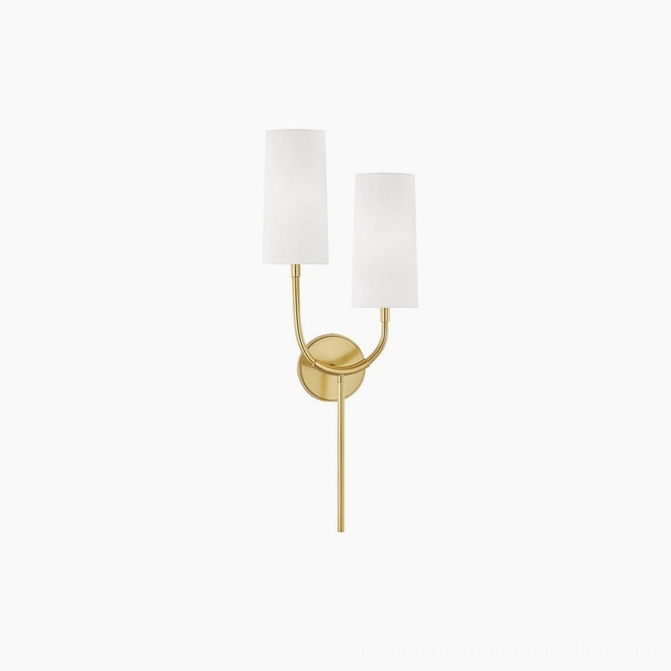 Brio double-arm mid-century modern wall sconce in warm brass finish with white fabric shades, front studio view