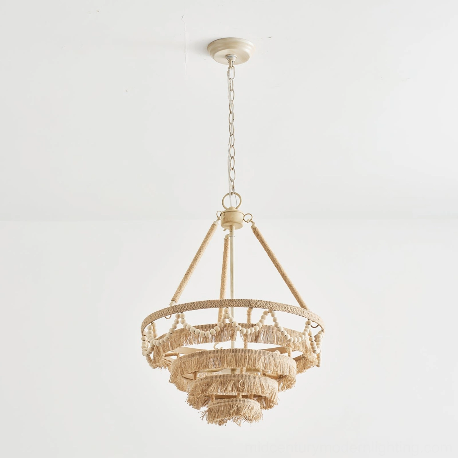 Side view of Bristol Bohemian Fringe Chandelier highlighting tiered structure and retro white finish