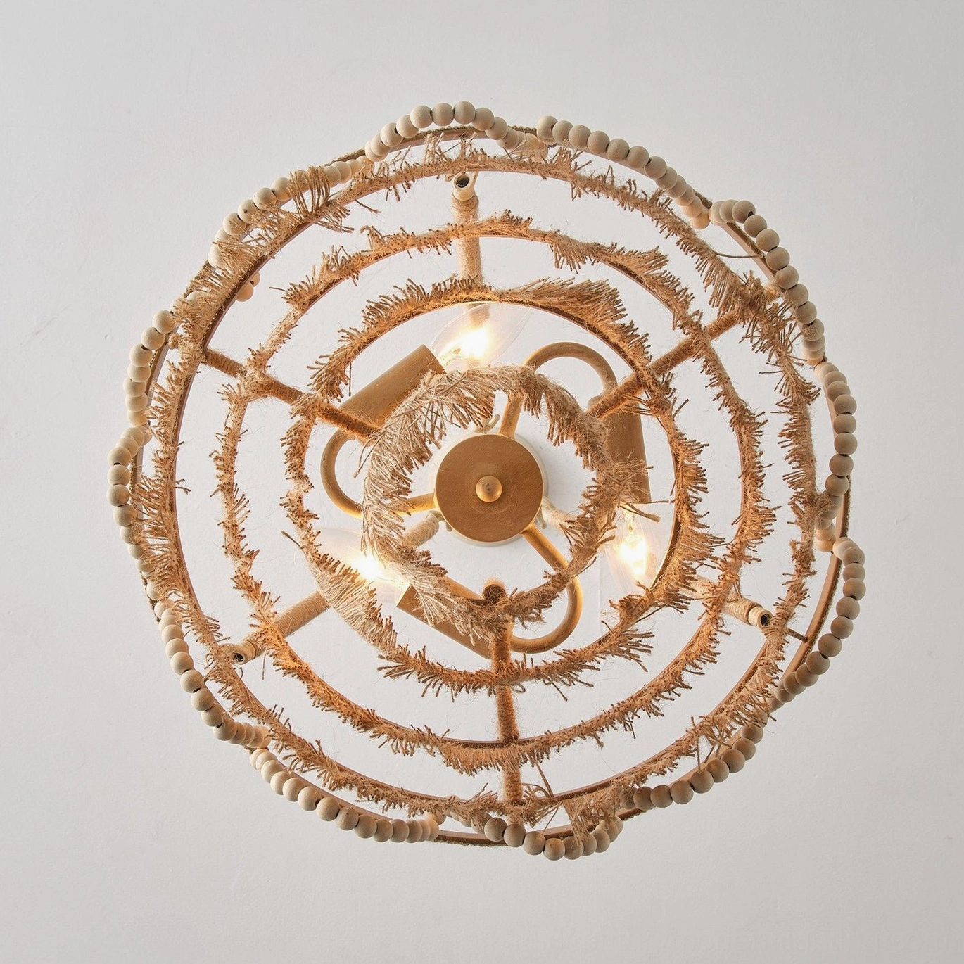 Overhead top-down view of Bristol chandelier showing circular bead trim and bulb socket arrangement