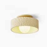 Brito textured flush mount ceiling light front studio view cream finish minimalist design