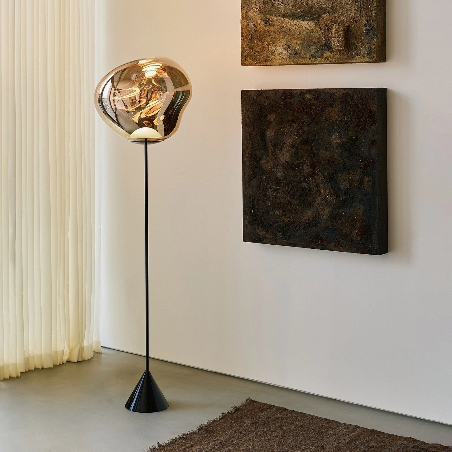 Bronze Lava Slim Floor Lamp in minimalist living room with wall art, modern sculptural floor lighting