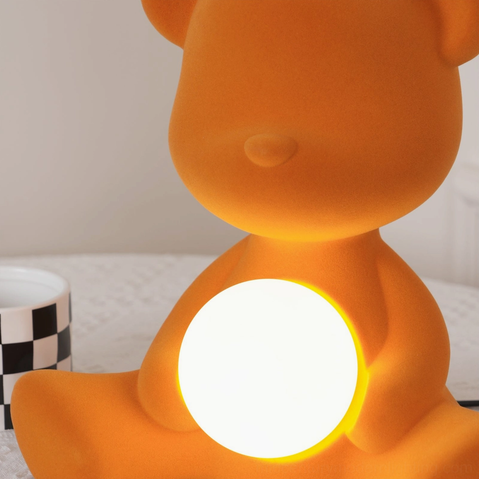 Brown teddy bear table lamp frontal view on plain background