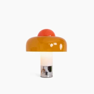 Brumbry mushroom table lamp with amber orange glass shade and polished chrome base, front view on white background